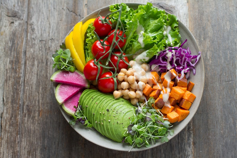 Colorful bowls of plant-based ingredients on a table